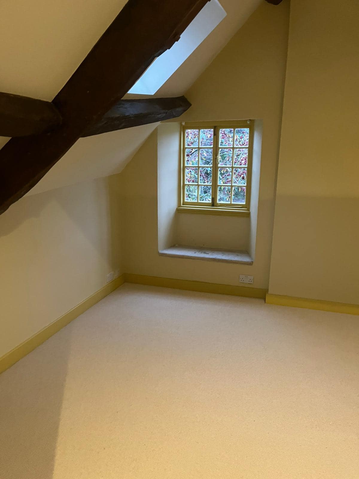 window wood beam paint yellow cream